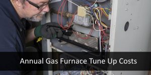 hvac service man checking furnace tune up costs maintenance