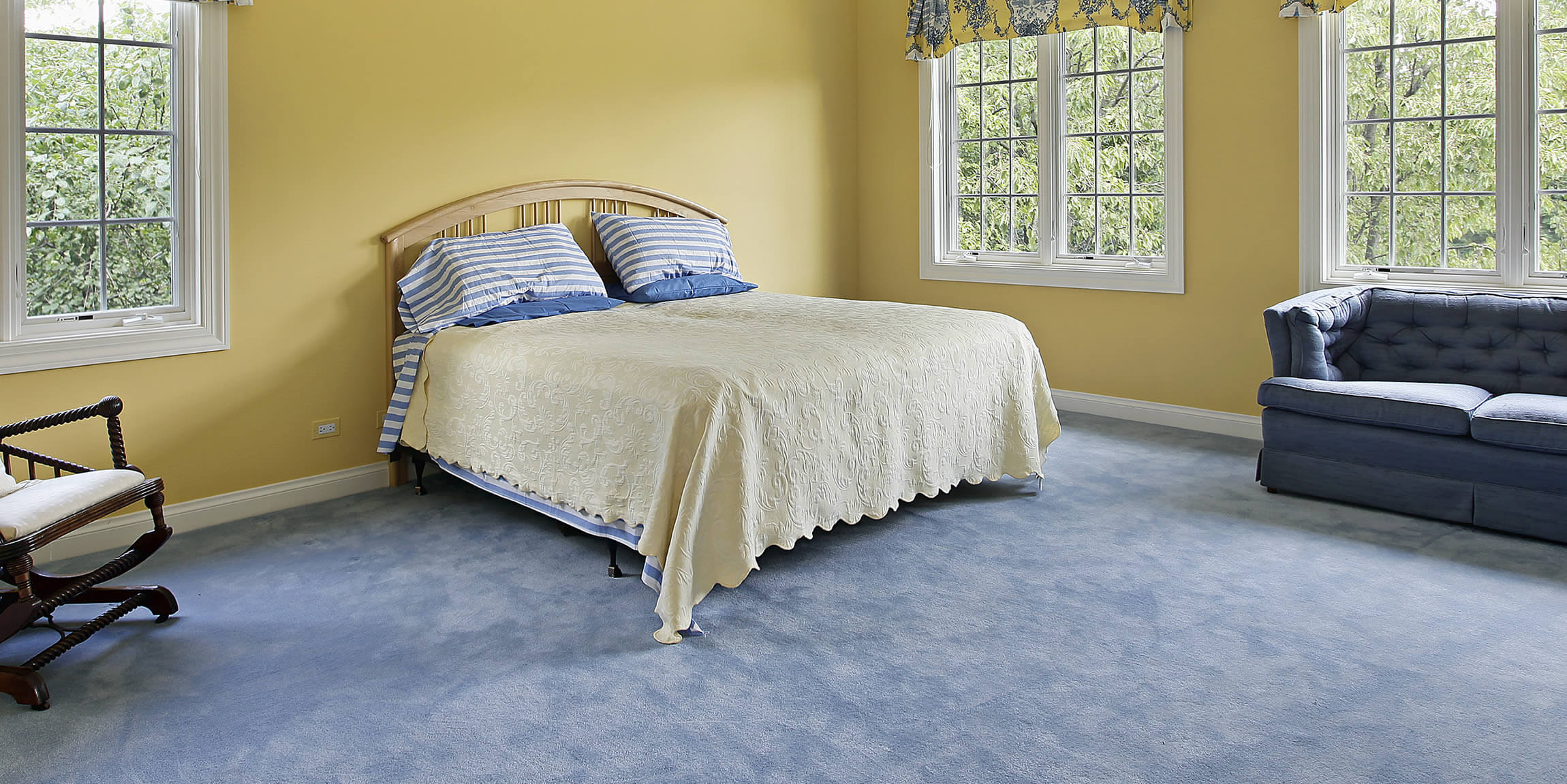 blue carpet on bedroom floor