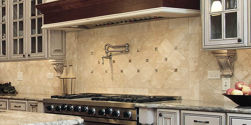 modern kitchen with pot filler over stove