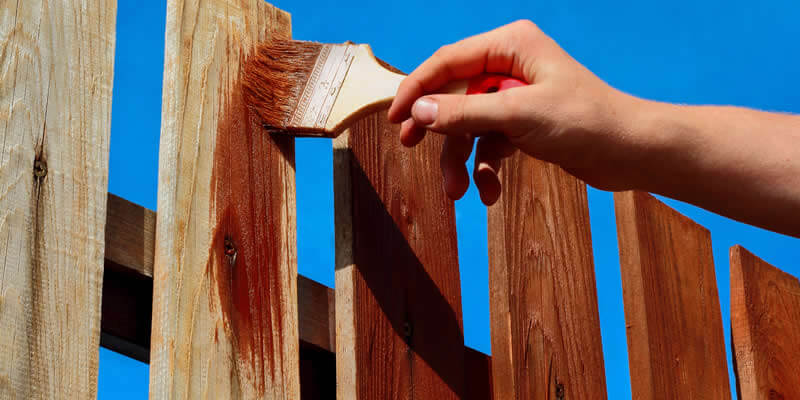 Cost To Paint Or Stain A Wood Fence 2022 Costimates Com