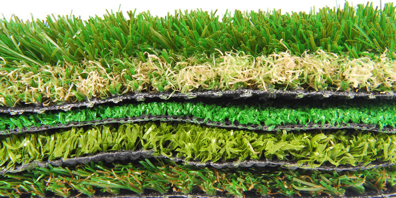 different types of artificial grass stacked up