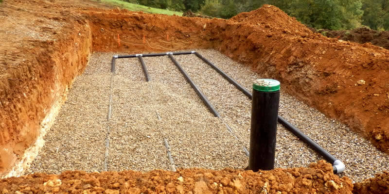 leach field with stone for septic tank system