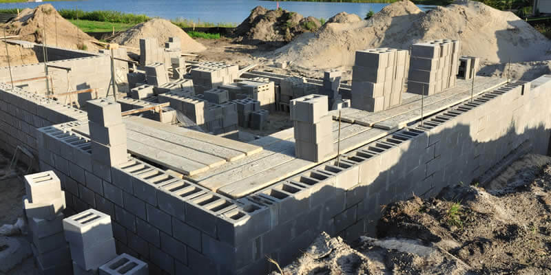new home foundation built with cinder blocks